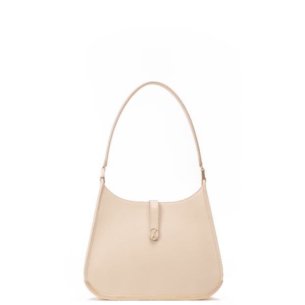 A medium-sized beige bag with a minimalistic design and curved edges. It has a golden metal frame on the bottom and a golden magnet with the Vaulie icon in the center. This luxury ICON bag, made in Italy, is ideal for an elegant businesswoman.