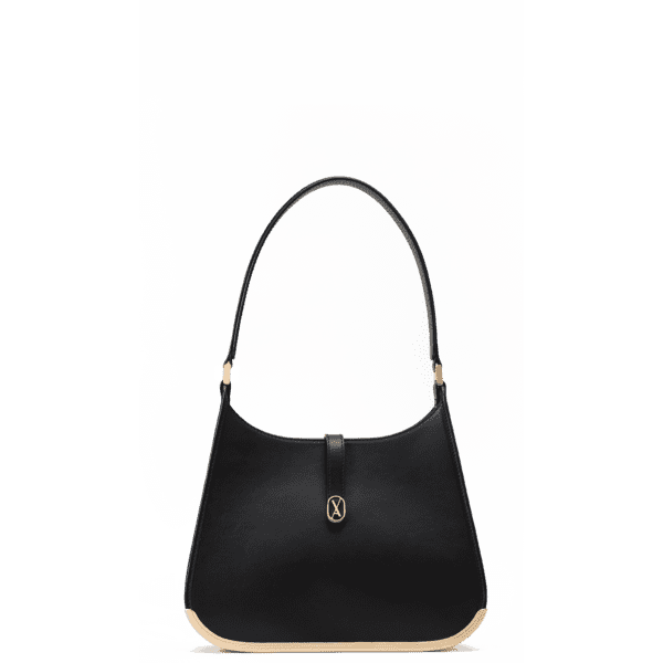 A medium-sized black bag with a minimalistic design and curved edges. It has a golden metal frame on the bottom and a golden magnet with the Vaulie icon in the center. This luxury ICON bag, made in Italy, is ideal for an elegant businesswoman.