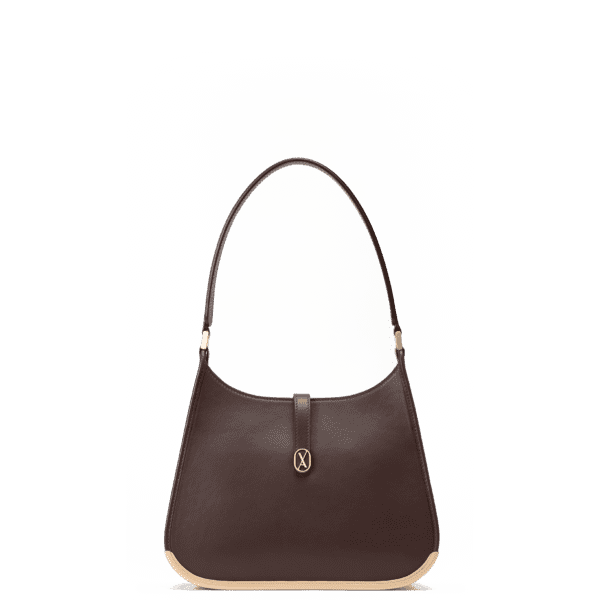 A medium-sized dark brown bag with a minimalistic design and curved edges. It has a golden metal frame on the bottom and a golden magnet with the Vaulie icon in the center. This luxury ICON bag, made in Italy, is ideal for an elegant businesswoman.