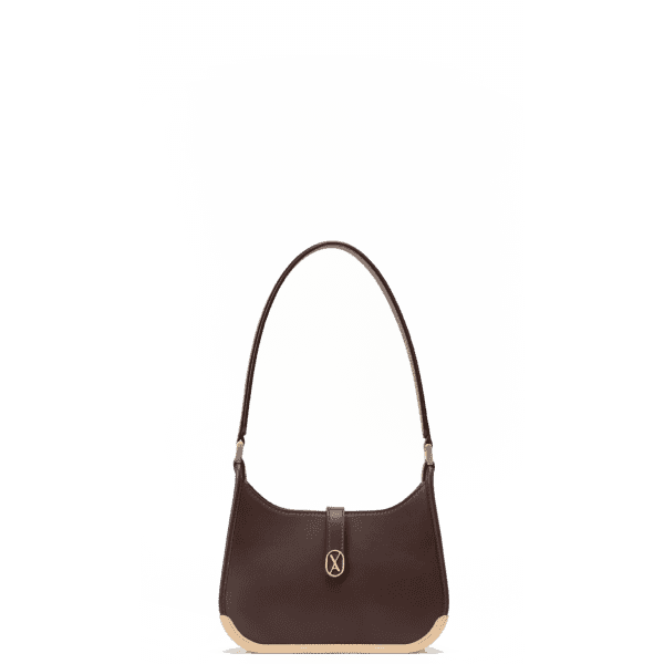 A small-sized dark brown bag with a minimalistic design and curved edges. It has a golden metal frame on the bottom and a golden magnet with the Vaulie icon in the center. This luxury ICON bag, made in Italy, is ideal for an elegant woman.